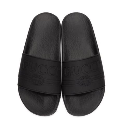 gucci embossed logo slide sandals|Gucci logo photos.